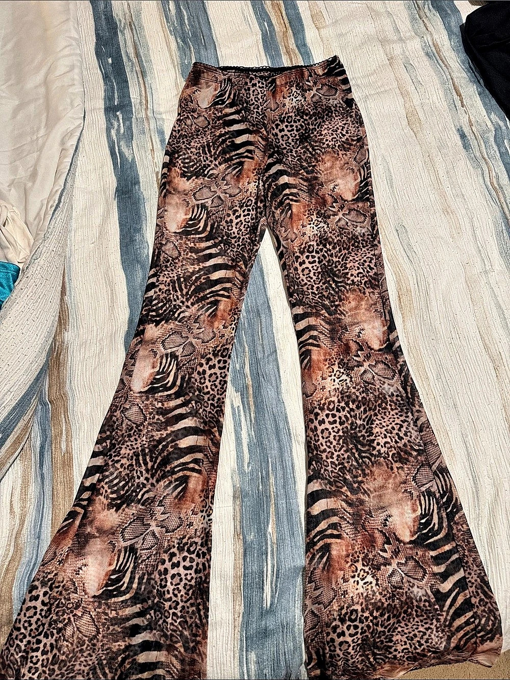 Fashion Nova Talk To You Later Animal Print Mesh Flare Pant Flare Pants in Brown